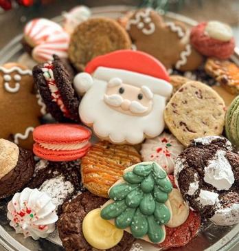 Christmas Themed colourful cookies in a bowl.