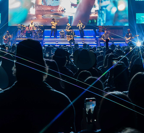 audience watching a band on stage