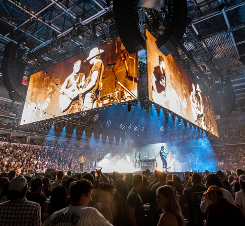 audience watching a band on stage