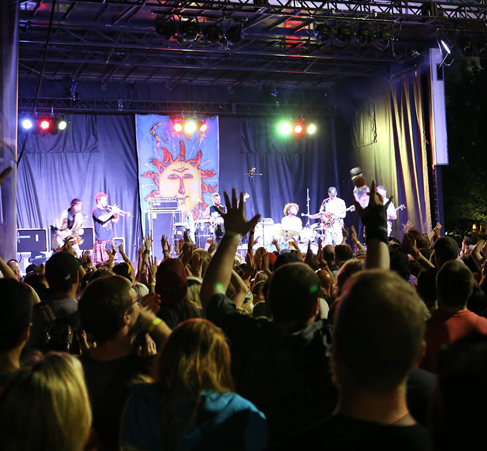 audience watching a band on stage