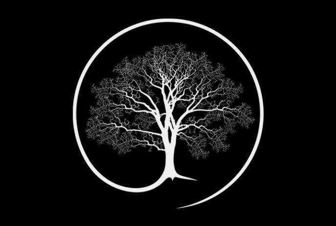 A white tree silhouette with intricate branches encased in a circular border on a dark, black backdrop.