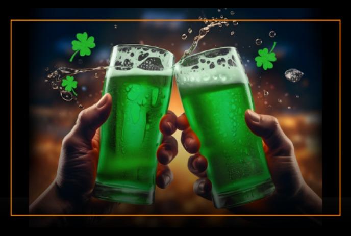 Two hands holding glasses of green beer clink together, with shamrocks and bubbles in the background.