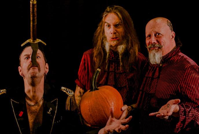 One person swallowing a sword and two other people looking on in astonishment.