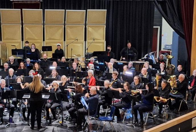 The London Concert Band performing on stage at a previous event.