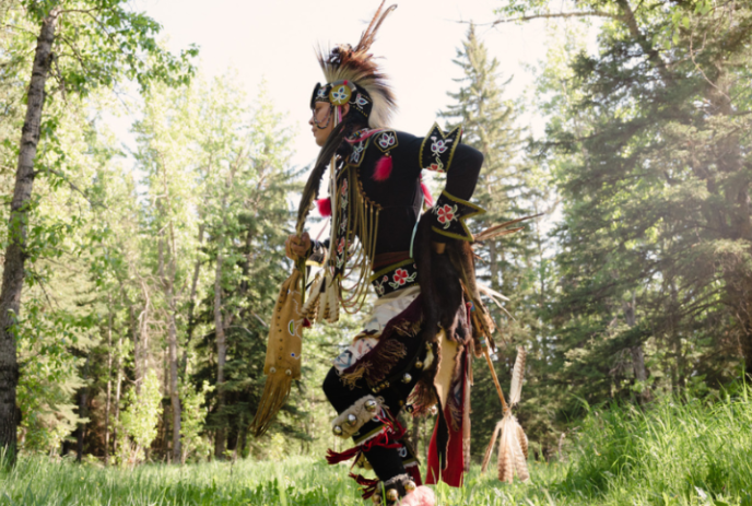 Indigenous person in the forest.