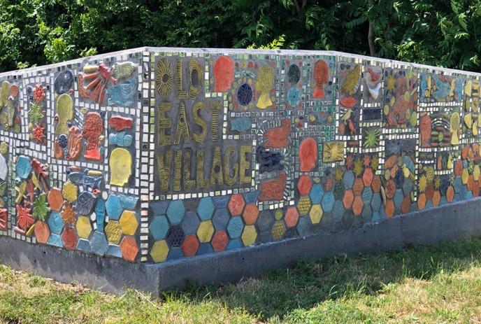 Close up of various tiles used to construct the Gateway Mosaic located in Old East Village, London, Ontario