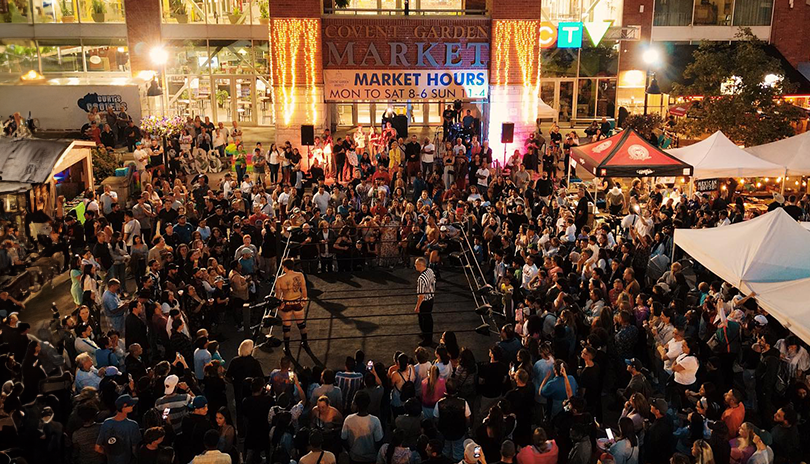 Crowd cheering on lucha libre wrestling at Covent Garden Market