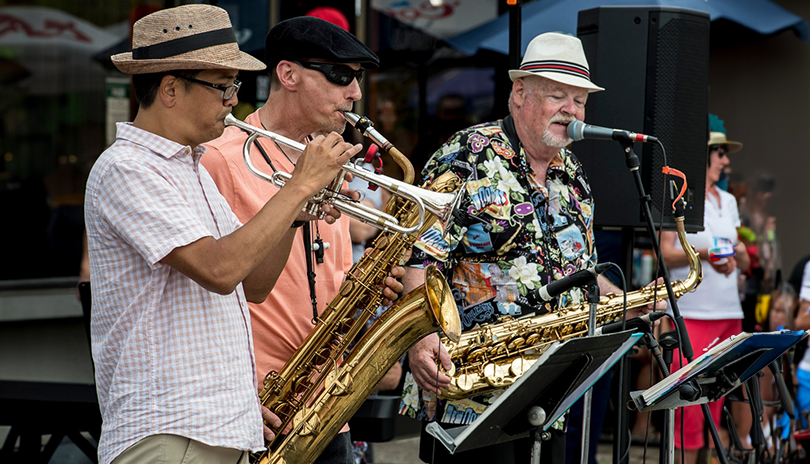 Three men playing jazz on saxaphones