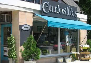 outdoor view of the main entrance of the Curiosities Gift Shop located in London, Ontario