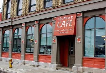 Exterior view of the front door entrance of YOU Made It Cafe located in London, Ontario.